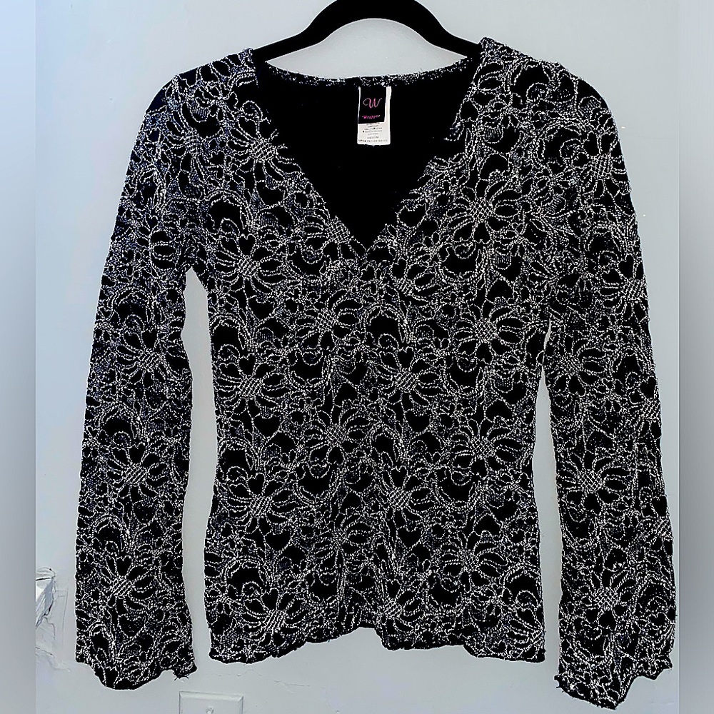 Woman’s black floral bell sleeve top